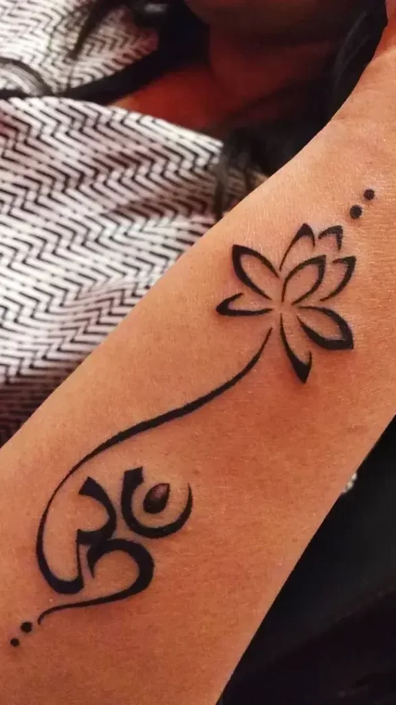om-lotus-tattoo-on-exterior-forearm-tattoo