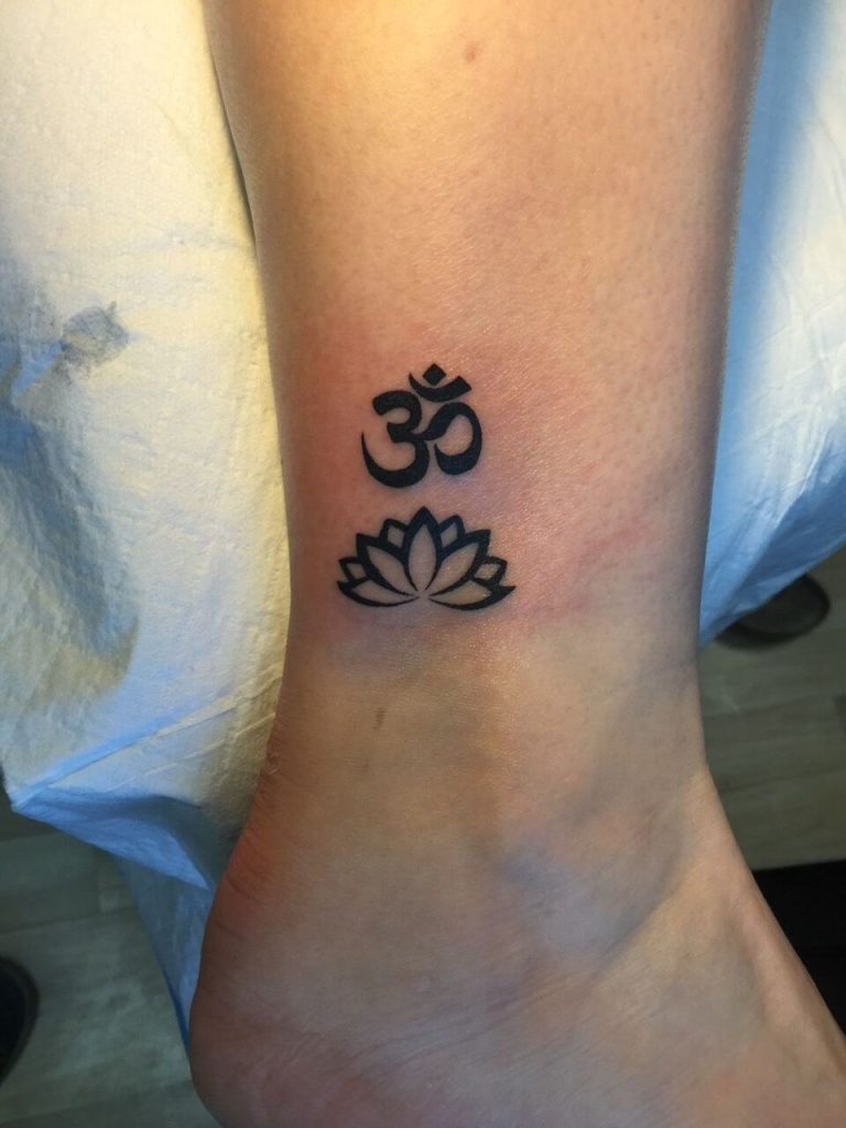simple om tattoo design with flower